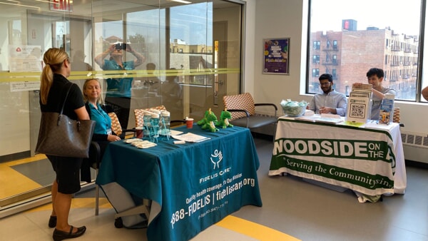 Fidelis Care and Woodside on the Move host informational tables at Apicha’s annual National Health Center Week Health Fair